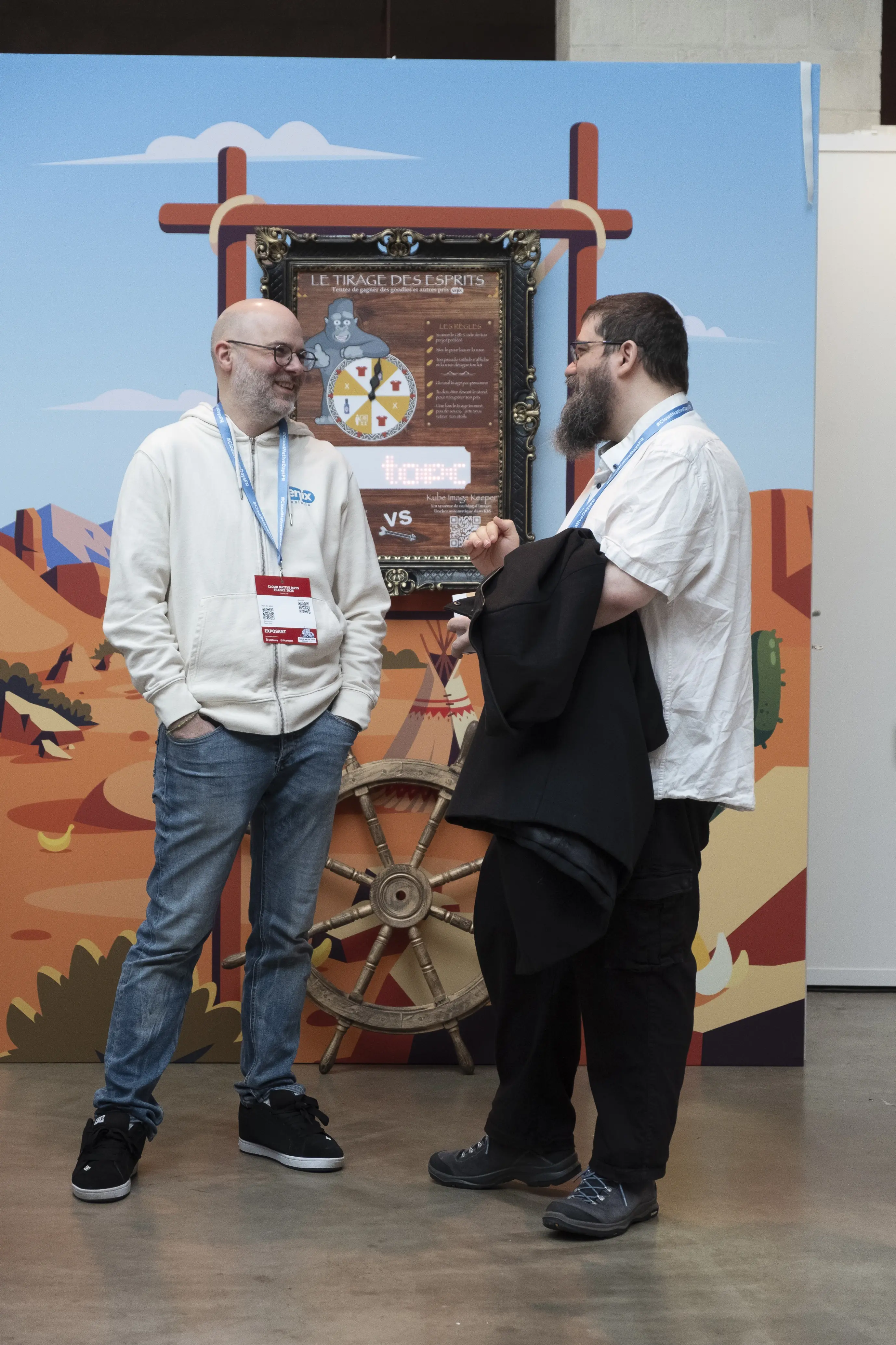 Un échange entre deux personnes au stand Enix